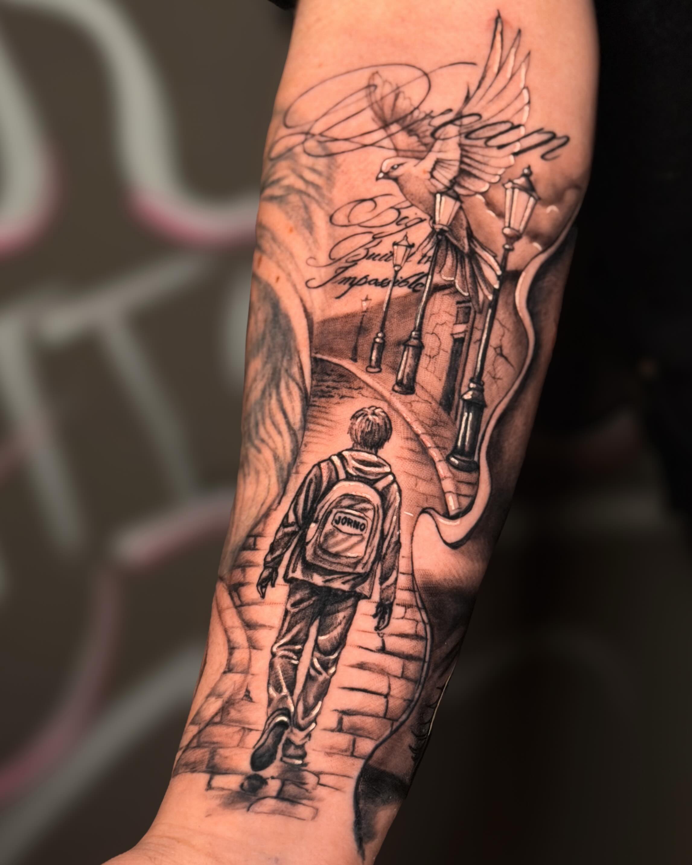 Fine-line boy walking on path tattoo
