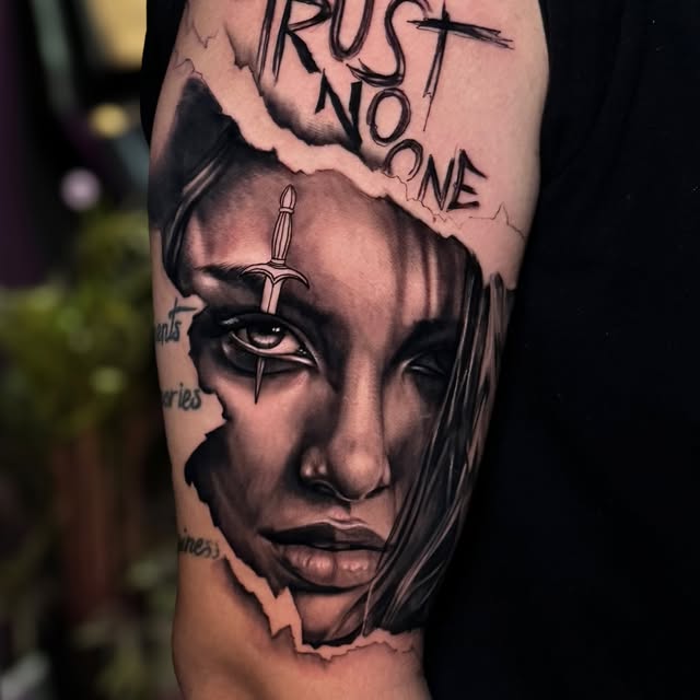 Portrait tattoo, Trust No One